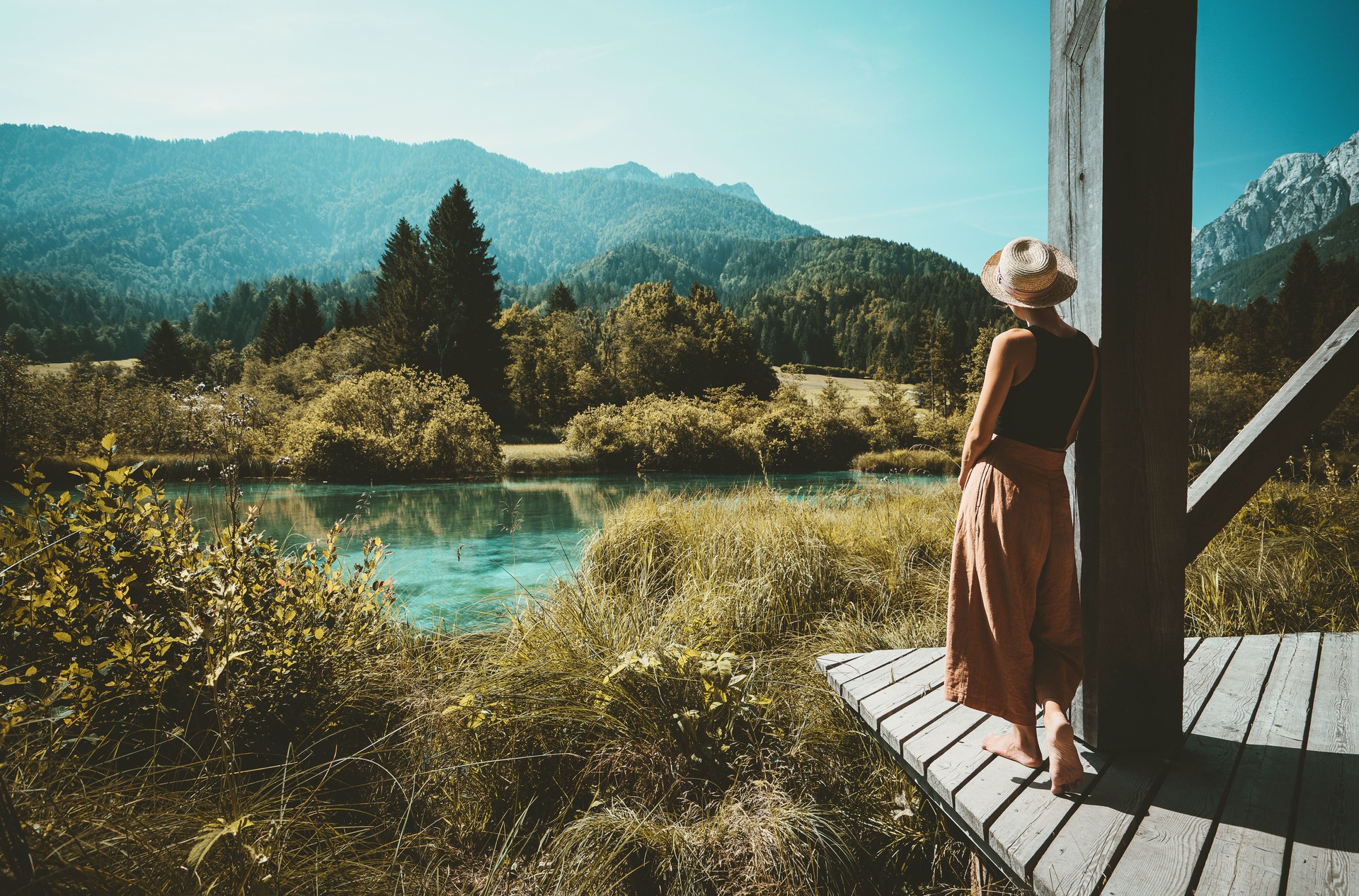 Woman enjoying freedom on nature outdoors. Travel Slovenia Europe.